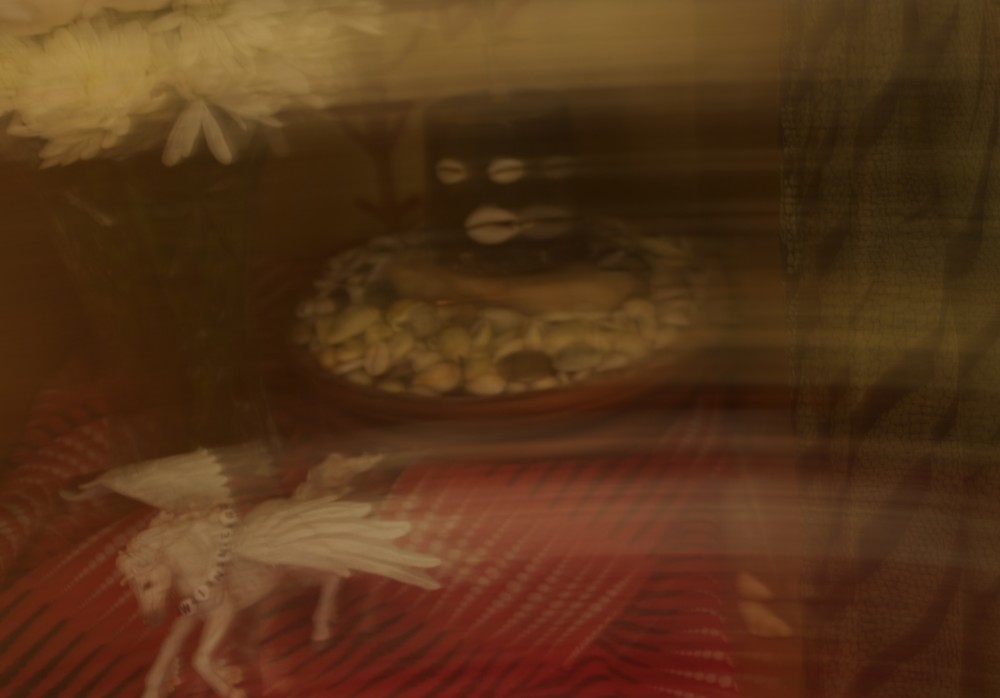 Pegasus horse flying in for a landing at Eshu Opin's shrine